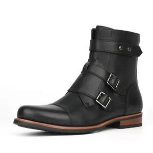 Detailed side view of men's black vintage leather boots with metal buckles and side zipper