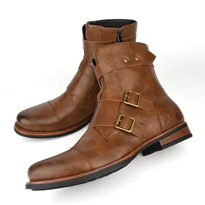 Detailed side view of brown vintage men's boots featuring metal buckles and side zipper