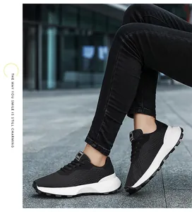 Black breathable mesh sneakers for teenagers in a stylish urban outdoor setting