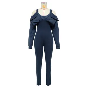 Detail shot of navy blue distressed off-the-shoulder tight jumpsuit on mannequin
