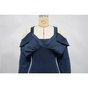 Detail of washed navy blue off-shoulder ribbed jumpsuit with ruffled chest design