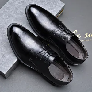 Elegant black lace-up men's dress shoes with subtle textured pattern for business wear