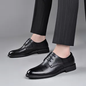 Elegant black lace-up business dress shoes for men featuring textured leather pattern