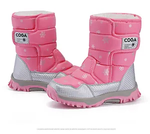 Pink children's waterproof winter snow boots with warm fur lining and snowflake patterns