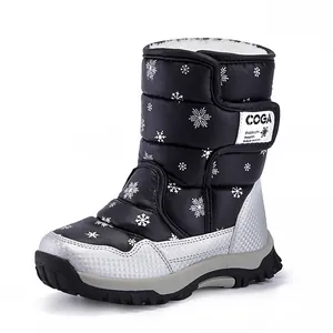 Warm waterproof children's winter snow boots featuring snowflake patterns and plush lining