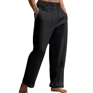 Detailweergave van de zwarte linnen herenpantalon met hoge taille en knopen