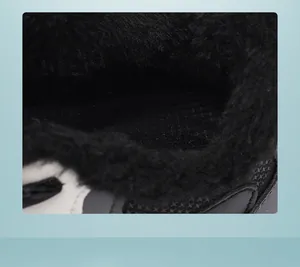 Macro detail showing the thick warm black faux fur lining in children's winter shoes