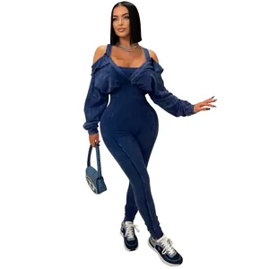 Sexy off-shoulder washed blue bodycon jumpsuit with matching shrug for a chic street look.