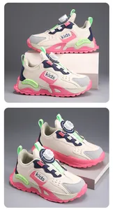Detailed close-up view of kids' winter sneakers featuring a rotary dial lacing system