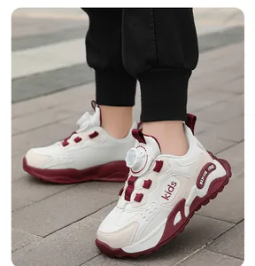 Close-up of children's sports shoes featuring a convenient rotary dial lace system