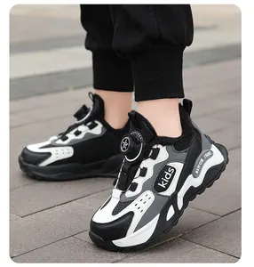 Close-up of kids warm winter padded sports shoes with adjustable rotating buckle system