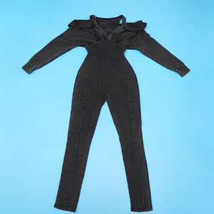 Full view of washed distressed black long-sleeve jumpsuit with off-shoulder design