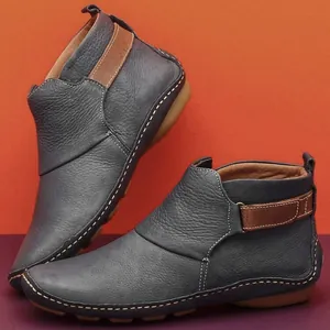 Bottines plates rétro en cuir souple bleu pour femmes avec détails de lanières brunes