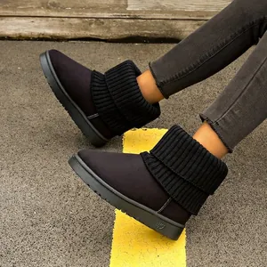 Stylish women's black platform snow boots with warm plush lining and knitted cuff