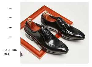 Detailed shot of shiny black patent leather Oxford shoes with vintage square toe