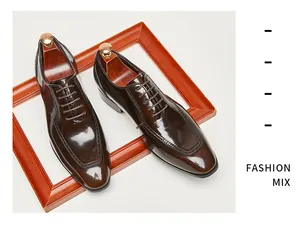 Close-up of polished dark brown patent leather Oxford shoes with square toe design