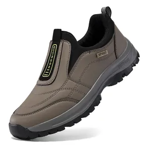 Side view of men's brown outdoor walking shoes with durable non-slip rubber soles