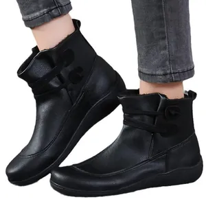 Élégantes bottines plates noires pour femmes avec doublure chaude et détails de lanière