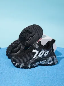 Detailed side and outsole view of boys' black breathable mesh sneakers with 700 print