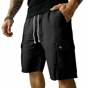Close-up detail of black men's cargo shorts with drawstring waist and flap pockets