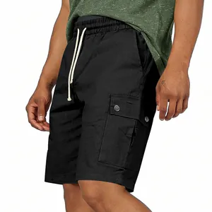 Macro view showing details of black cargo shorts with drawstring and side pocket