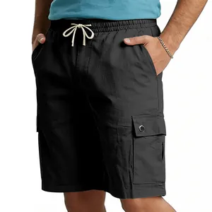 Detail view of men's slim fit black cargo shorts with drawstring waist and pockets