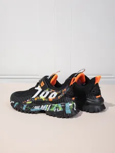 Detailed view of boys' breathable mesh sneakers with vibrant graffiti and 700 print