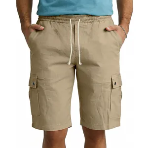 Detailed shot of men's khaki slim-fit cargo shorts with side pockets and drawstring waist