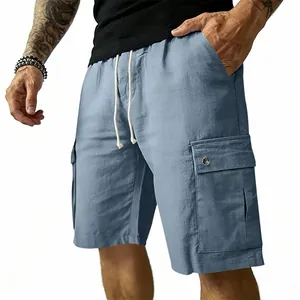 Detailed view of blue men's cargo shorts with drawstring waist and side pockets.