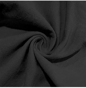Macro view of breathable black cotton-linen fabric texture with soft and elegant drape