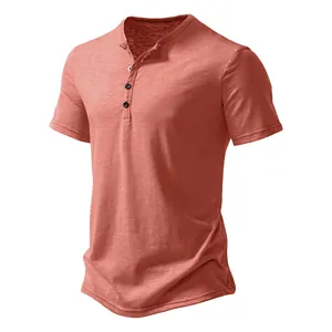 Close-up detail of coral red men's short sleeve Henley shirt with three-button placket