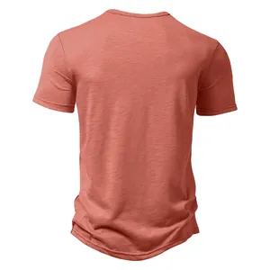 Detailed back view of a men's salmon red casual short-sleeve T-shirt with textured fabric.