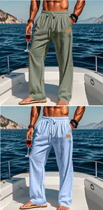 Detail of men's lightweight cotton linen drawstring trousers in sage green and light blue.