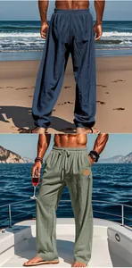 Detail view of men's cotton linen wide-leg beach pants in blue and olive green colors.