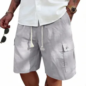 Close-up detail of men's grey slim fit cargo shorts with drawstring and pockets