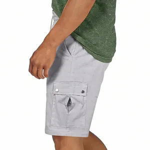 Detailed close-up showing the large cargo pocket on light gray men's casual summer shorts