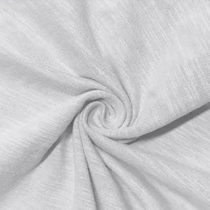 Close-up macro view of breathable white slub cotton fabric texture for men's T-shirt