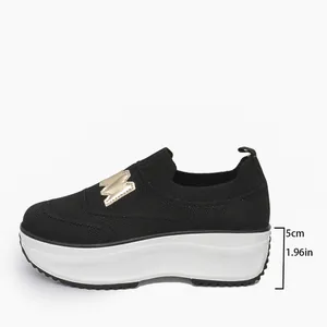 Women's black knit slip-on platform sneakers featuring a 5cm thick sole height detail