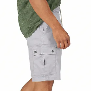 Detail shot of light grey men's cargo shorts featuring a functional side flap pocket