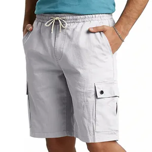 Detail view of light grey cargo shorts with pockets and drawstring waist for men