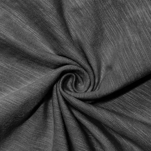 Macro detail of dark grey slub jersey fabric showing soft breathable texture