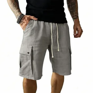 Detailed view of men's grey slim fit cargo shorts with drawstring and utility pockets