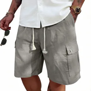 Detailed view of men's grey linen-textured cargo shorts with side pockets and drawstring.