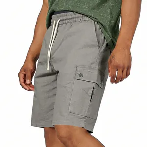 Detailed macro view of men's grey summer cargo shorts with drawstring and side pocket