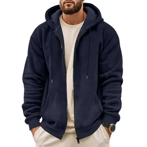 Detailed close-up of a navy blue heavyweight zip-up hoodie with textured fabric