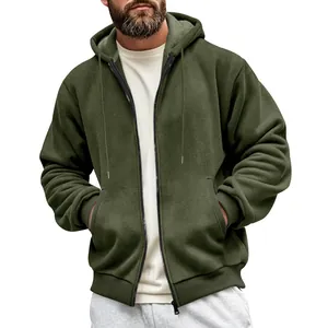 Macro detail of olive green heavy zip-up hoodie with textured fabric and fleece lining