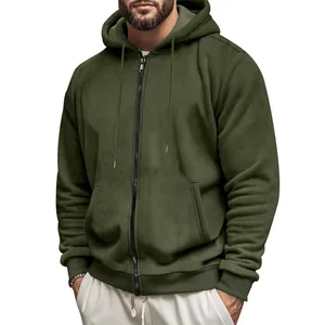 Detail view of olive green heavyweight zip-up hoodie with textured fleece fabric.