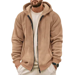 Detailed macro shot of heavy tan zip-up hoodie featuring premium textured composite fleece fabric