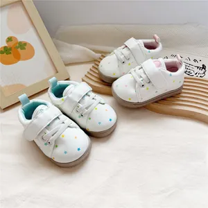Comfortable white toddler walking shoes with colorful star patterns and soft non-slip soles