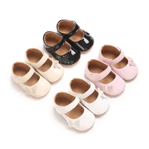 Collection of baby girl patent leather princess shoes in four colors with glitter bows